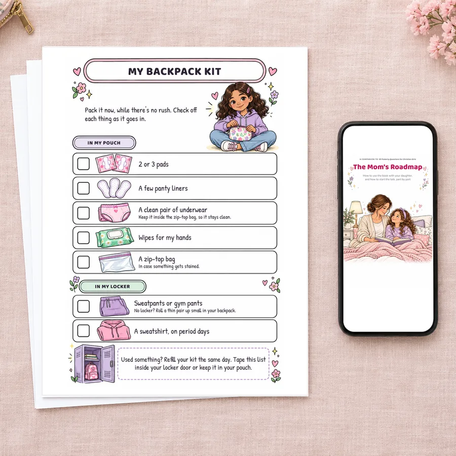 A printed page of the Cycle Starter Pack next to The Mom's Roadmap on a phone